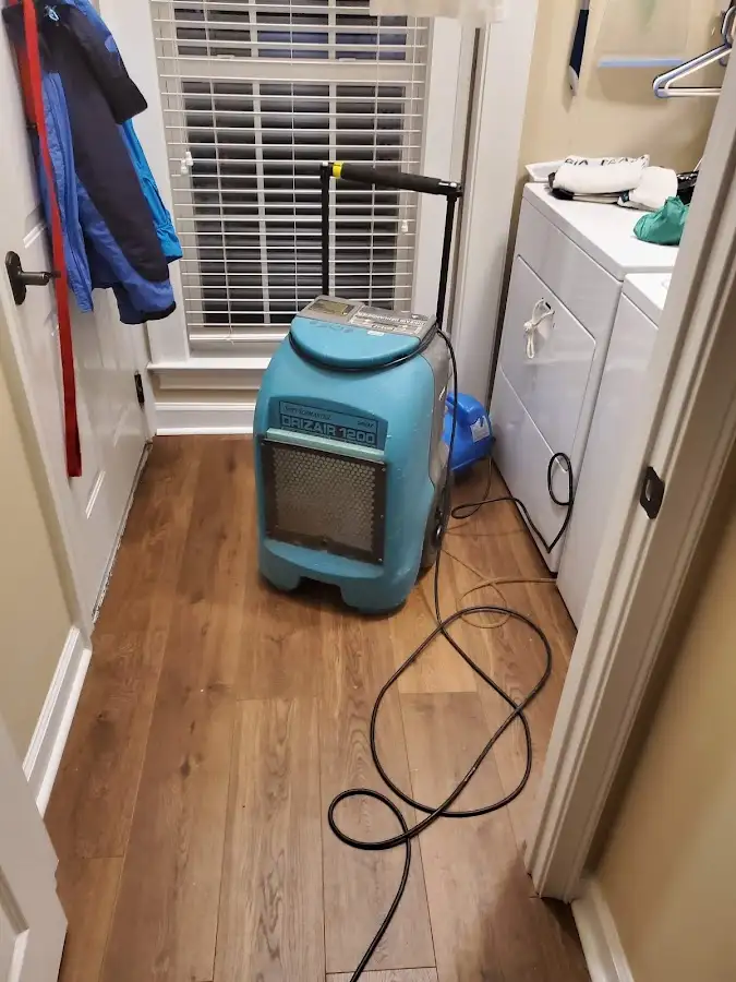 Commercial dehumidifier deployed for Flood Damage Cleanup in Forney